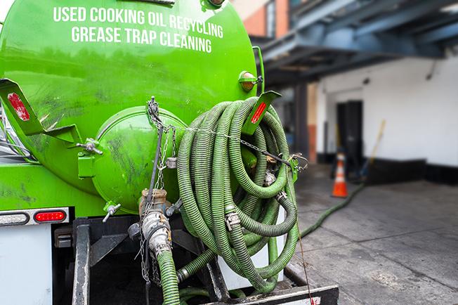 workers at Grease Trap Cleaning of Walker